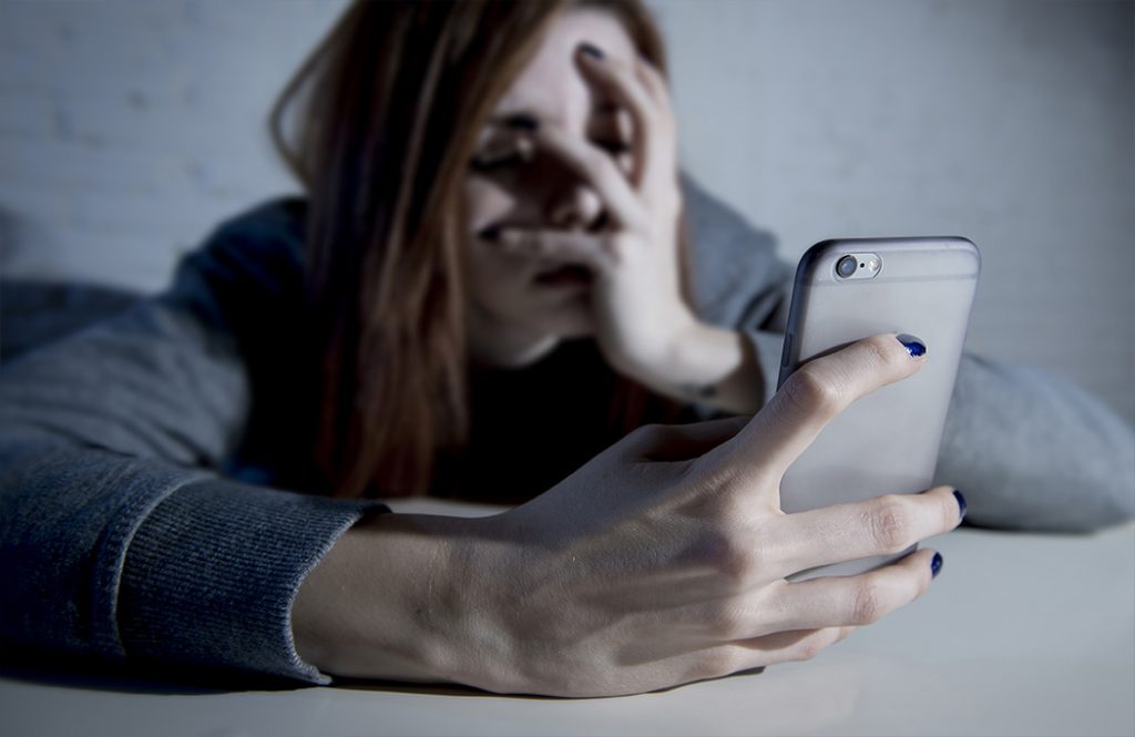 woman dealing with social media after breakup